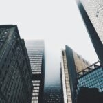 high-rise buildings covered with fog