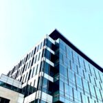 gray concrete building under white sky during daytime